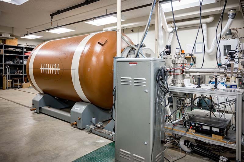 An accelerator painted like a football in the Rad Lab.