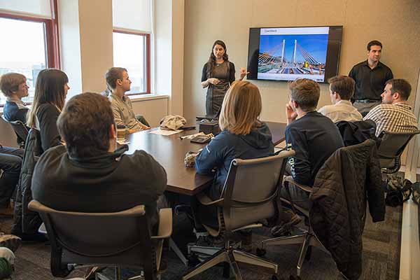Students listen to HNTB presenter Allison Halpern and Patrick D'Ambrosio (right)	at the Empire State Building.